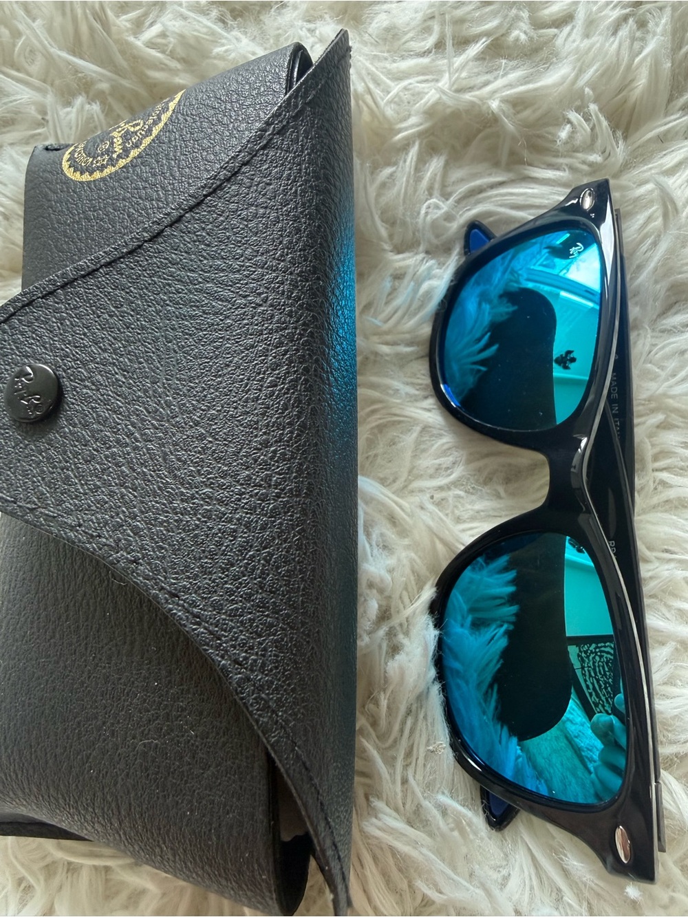Ray-Ban Black Frame Sunglasses with Blue Mirrored Lenses
